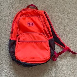 Neon pink under armor back pack.